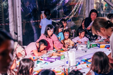 children drawing on craft table