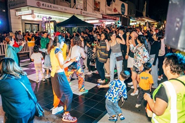 people dancing at street party